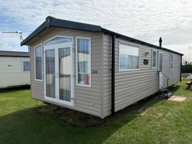 A mobile home exterior with steps and windows at Harlyn Hideaway (Swift Barritz) Padstow