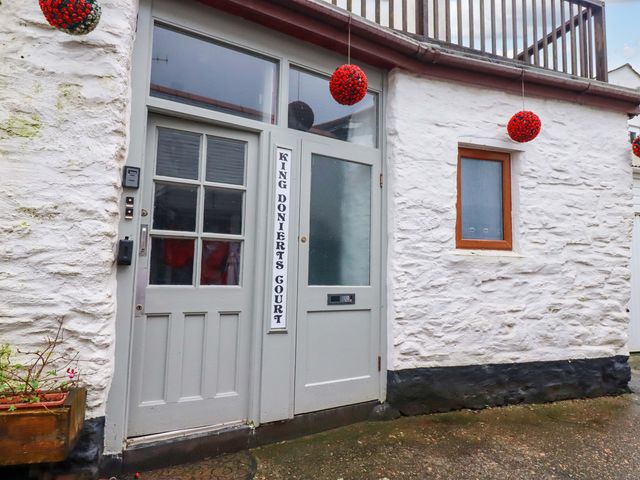 An entryway featuring a door and window at King Doniert's Court in Looe