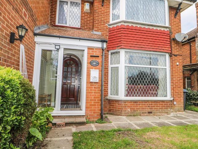 A front entrance with a door and bushes at The Retreat in Deal