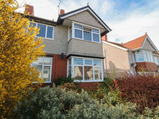 A house with windows and plants at Gwynfa in Colwyn Bay