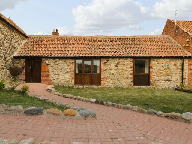 A building with stone walls and a tile roof at Daisy Nook in Hull