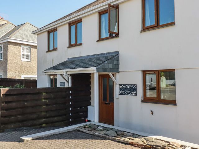 A house exterior with windows and a front door at Carnweather in Newquay
