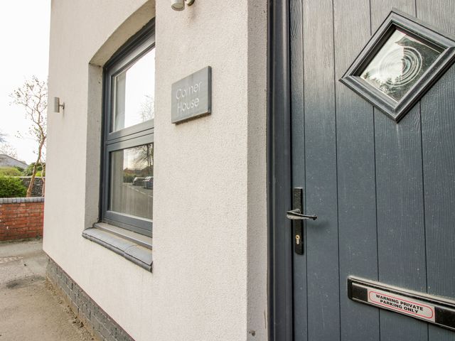 A house exterior with a door and window at Corner House in Minsterley
