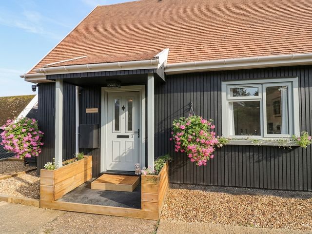 A front entrance with steps and flower planters at 3 Swedish House Walgrave