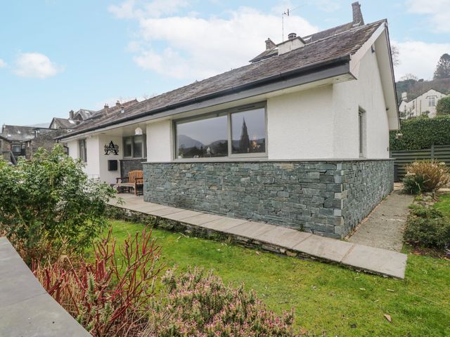 An exterior view of a house with a garden at Ambwray in Ambleside