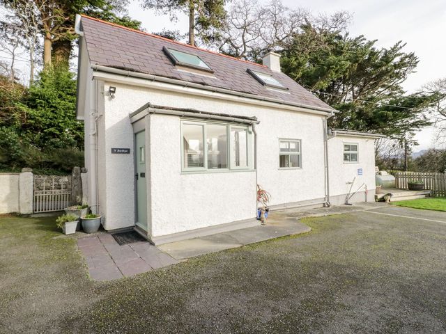 A house with a driveway and garden at Eryri View Retreat in 