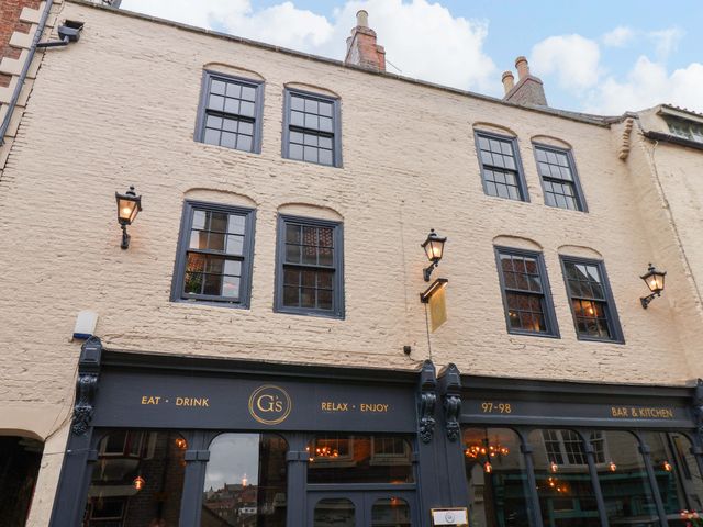 An exterior view of G's Loft with windows and lamps at G's Loft in Whitby