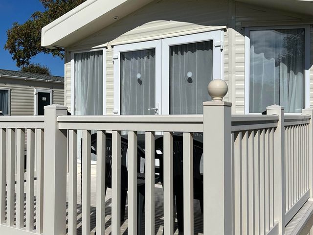 A static caravan with a veranda at Static Caravan Mallard Rise 22 Hoburne Devon Bay in Paignton