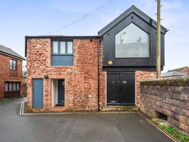 An exterior view of a building with windows and doors at Modern Seaside Cottage - Sleeps 5 in Paignton