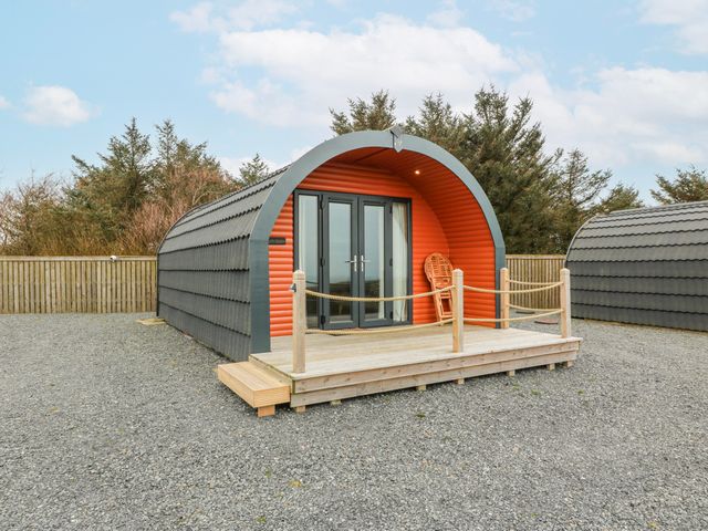 A cabin with a deck in an outdoor area at Keith in Stoneykirk near Sandhead