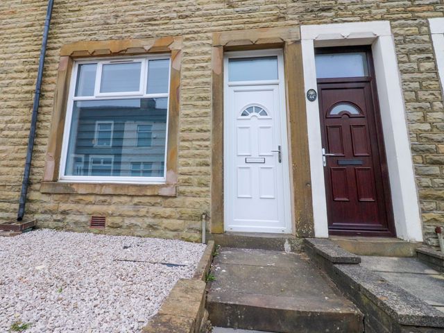 An exterior view showing two doors and a window at 46 Marlborough Road Accrington