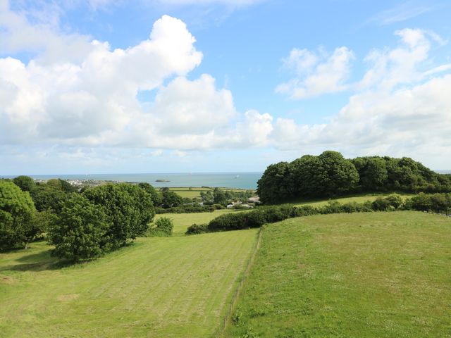 A landscape view featuring fields and trees at Glynllifon 9 Marian-glas near Benllech