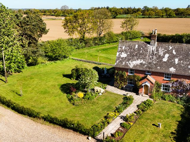 A house with a garden and pathway at Cutbush Farmhouse in Hingham