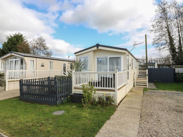 A caravan with a porch and steps at 2 bed Caravan Stowmarket
