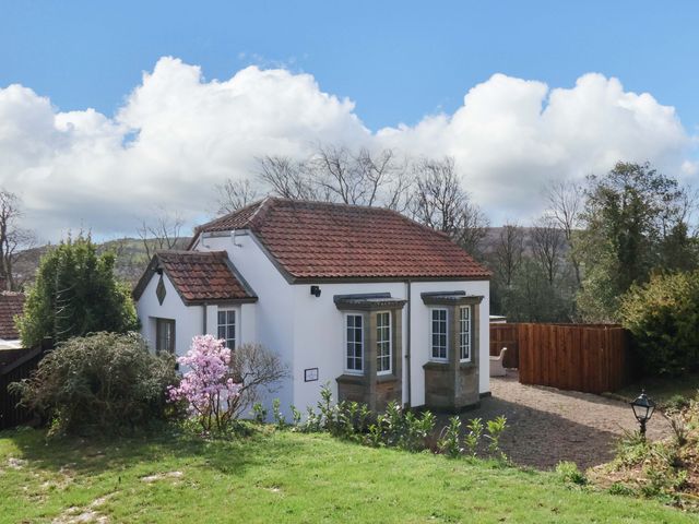 A house with flowers in the garden at Little Acorn in Whitby