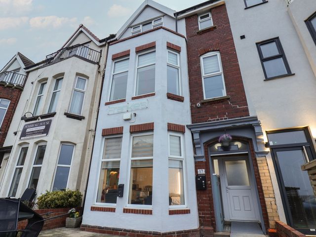 A house exterior with windows and a door at Frankie’s Seaview 3 in Bridlington