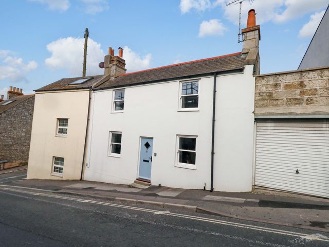 A house with white facade and windows at NO 10 Fortuneswell