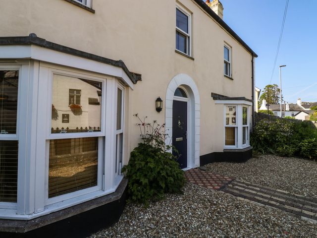 A house with windows and plants at Flat 1 in Kingsteignton