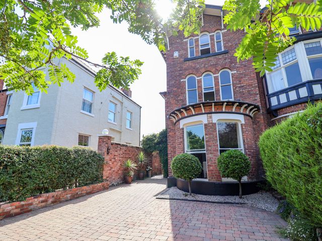 A house exterior with driveway and landscaping at 34 Eaton Road Chester