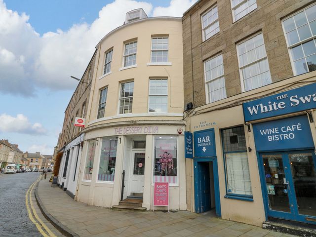 A storefront of The Dessert Diva and The White Swan in Kelso