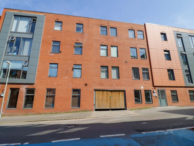An exterior view of an apartment building at Apartment 15 in Birmingham