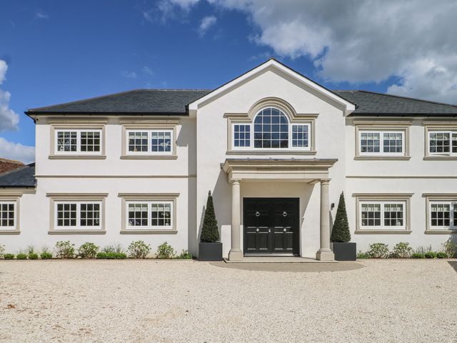 A house with windows and a front door at Sea Estate House in Littlehampton
