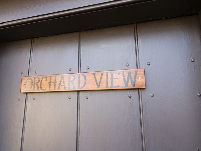 A sign that reads Orchard View on a door at Orchard View in Oakerthorpe