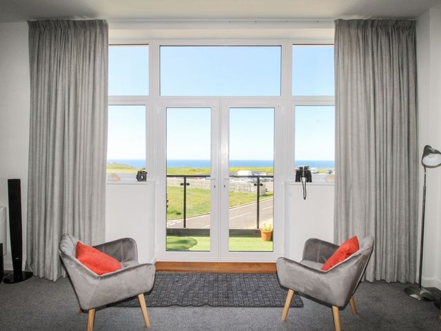A living room with a sea view at Portland View in Portland Bill