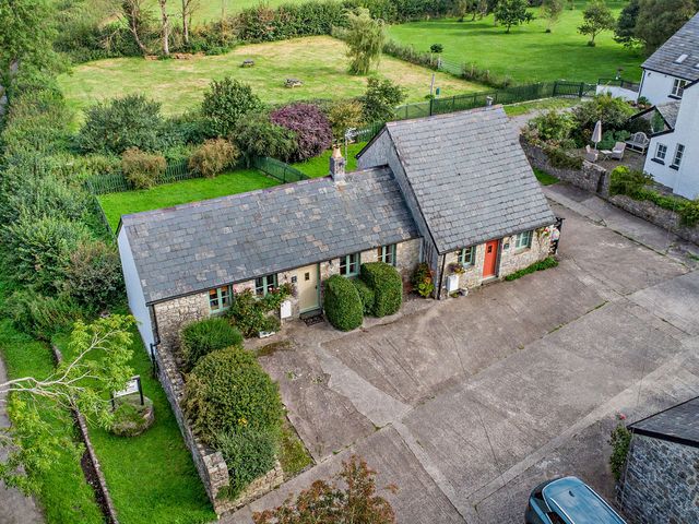 An overview of a house and garden at Wren Cottage in Cowbridge