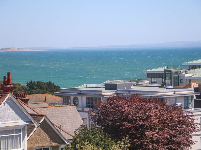 A view of buildings and ocean at Shoreline Retreat in Bournemouth