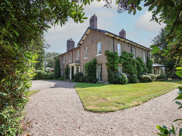 A house with a garden and gravel driveway at Parkfields House Tittensor near Barlaston