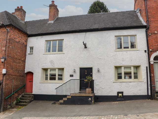 A house with a front door and windows at Lion House in Ashbourne
