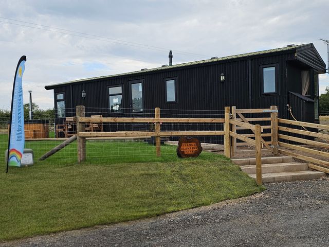 An outdoor view of a cabin at Frank's Glamping Farm in Nercwys near Mold