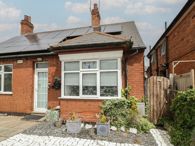 A house exterior with a garden at Mount Joy in Leicester