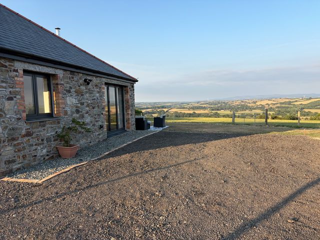 An outdoor area with stone wall and gravel at Up Top in Launceston