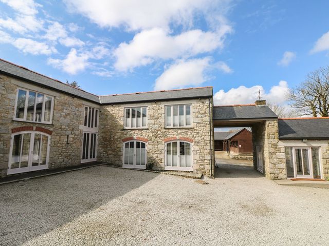 An exterior view of a stone building with ample windows at Argal in Treverva near Constantine