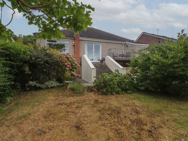 A house with stairs and garden at Nampara in Colwyn Bay