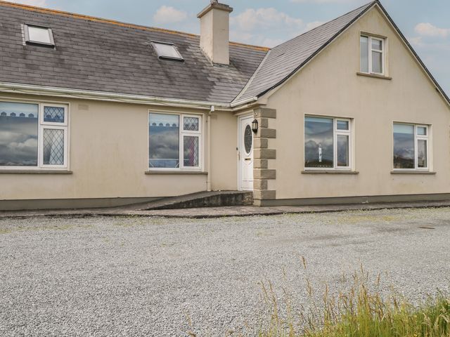 A house with gravel driveway at Islands Inn in Louisburgh, County Mayo