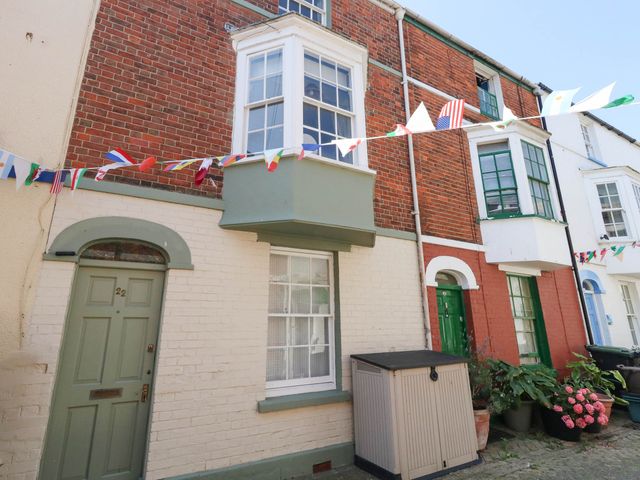 A residential building with a door and window at The Watch House in Weymouth