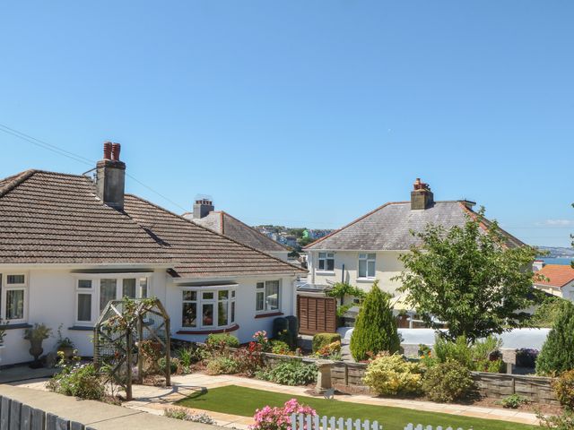 A view of houses and garden at 3 Heath Park in Brixham