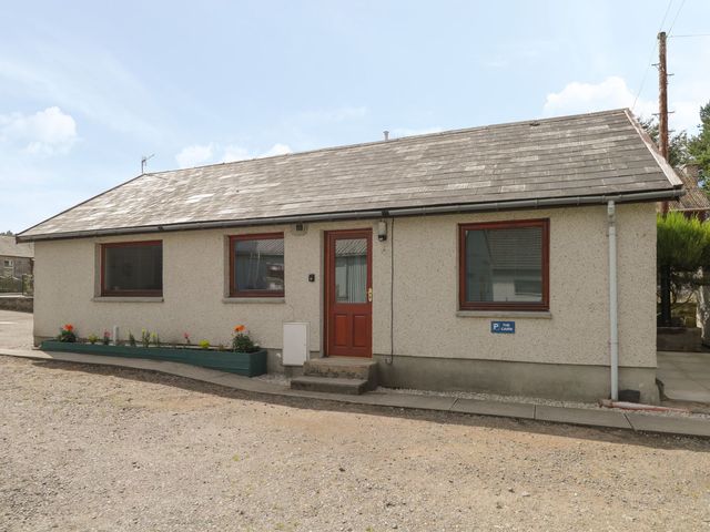 A house with a parking sign at The Cairn