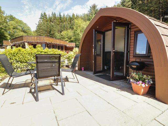 An outdoor seating area with a glamping pod at Gortin Glen Glamping Pod 2 in Omagh
