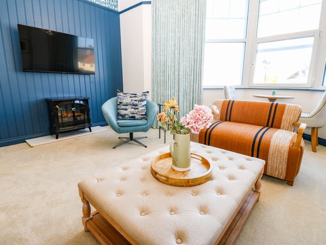 A living room with a television and coffee table at Bishops Quarter - Barrington in Bishop Auckland