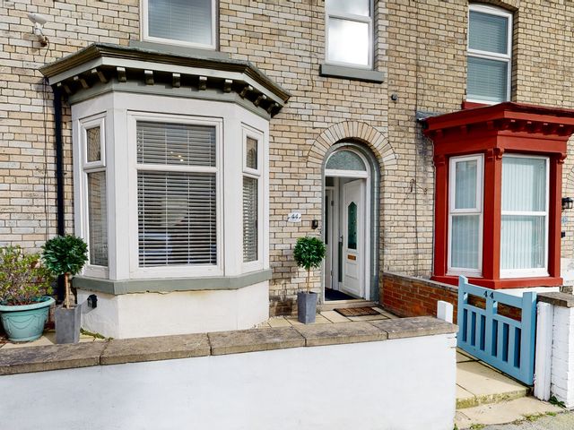 An entrance with a doorway and nearby plants at 44 Norwood Street Scarborough