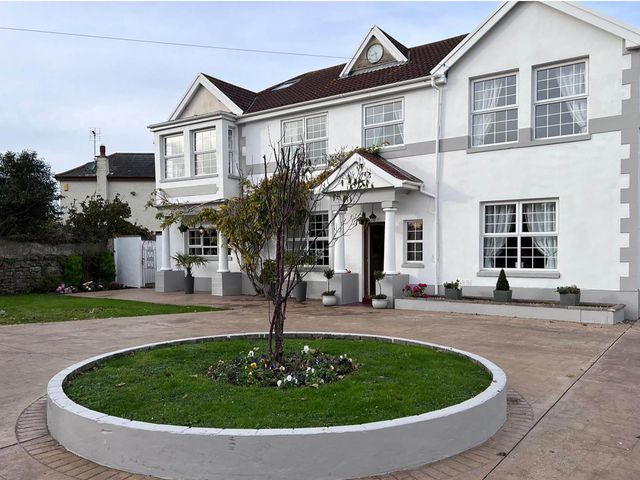 A house with a garden and driveway at Build your memories hot tub garden sleeps 14 Nottage
