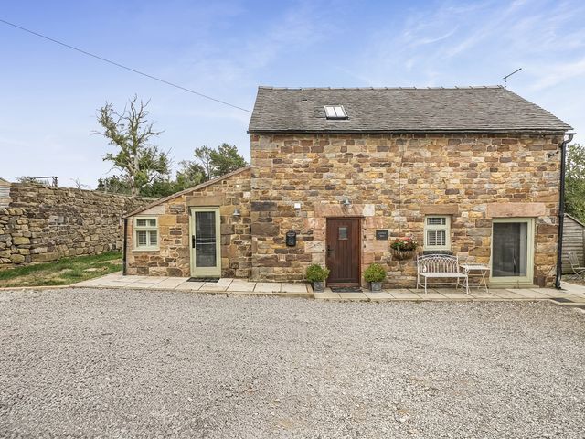 A stone building with a front door and windows at Barn Sleeps 4 Parking Near Alton Towers Waterhouses