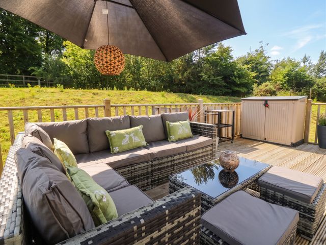 An outdoor living space with furniture at The Manor’s Retreat in Dunbar