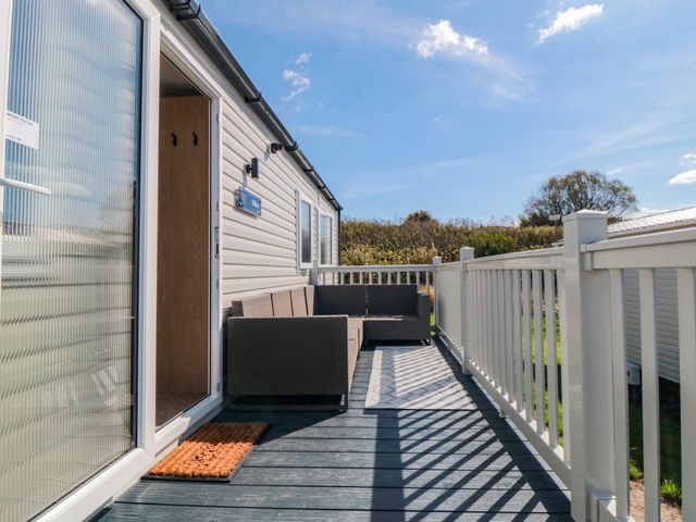 An outdoor area with a deck and seating at 5 Rowen Court in Scarborough