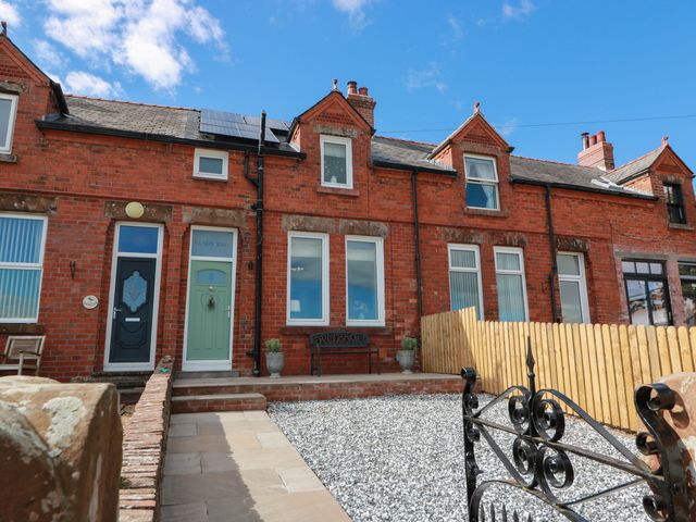 A house exterior with a front door and gravel at Sandy Toes in Powfoot, Annan