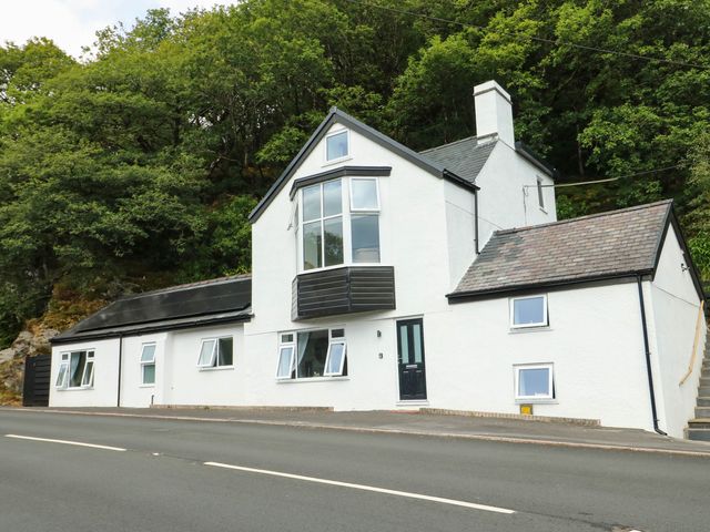 A house with multiple windows and a front door at River View in Betws-y-Coed